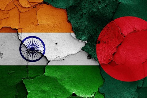 Flags of India and Bangladesh painted on cracked wall