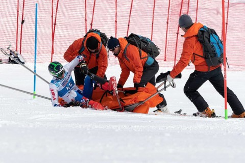 KAMCHATKA PENINSULA, RUSSIA, MAR 28, 2019: Rescuers Kamchatka Rescue Squad on alpine ski evacuate