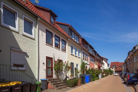 Terraced houses with rubbish bins in the city centre, residential building, Hildesheim, Lower