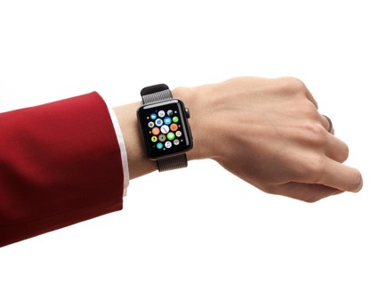 Woman hand with Apple Watch series 2 smartwatch on her wrist displaying app icons isolated on white
