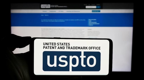 Stuttgart, Germany, 10-29-2023: Person holding smartphone with logo of agency United States Patent