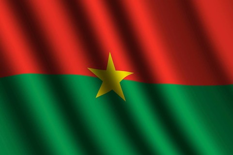 The Burkina Faso flag flying in the wind