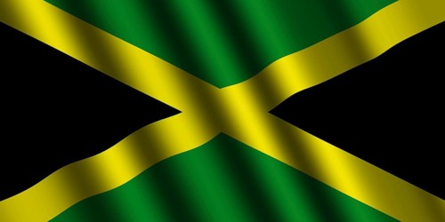 The Jamaica flag flying in the wind