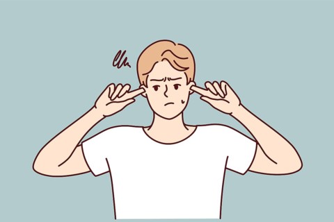 Offended guy closes ears does not want to hear toxic words or insults from peers or girlfriend.
