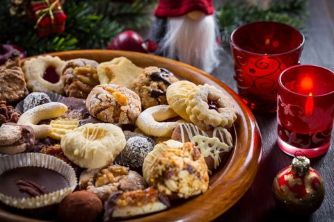 Assortment of homemade Christmas cookies with ornaments