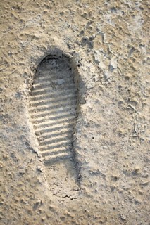 Footstep pattern seen on a concrete background