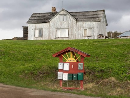 Derelict house on the shore of the Arctic Ocean, beside the town of Nesseby, May, Varangerfjord,
