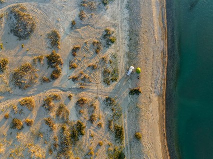 Top-Down, Camping with car, Aerial view, Landscape at Lake Issyk Kul, Kyrgyzstan, Asia