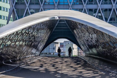 The Parkbruk, cycle and pedestrian bridge in the city centre of Antwerp, crosses a multi-lane city