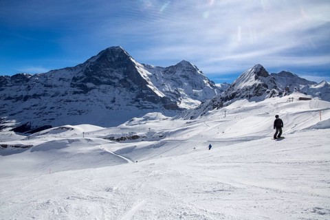 Skiing against the backdrop of the north face of the Eiger in Grindelwald, Switzerland, Europe