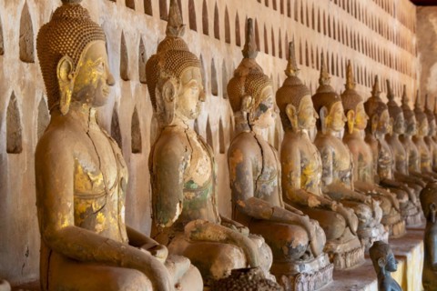 Ancient Buddha statues in the courtyard of Wat Si Saket, Vientiane, Vientiane province, Laos, Asia
