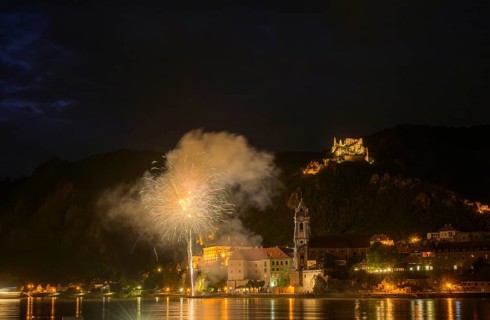 Solstice fireworks with a view of Dürnstein, Rossatz-Arnsdorf, Lower Austria, Austria, Europe
