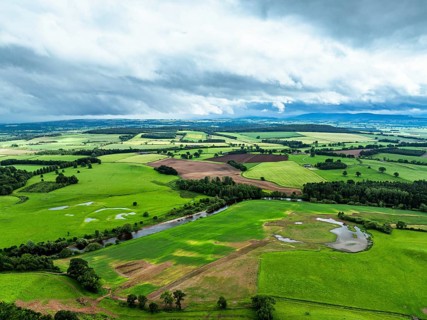 Farms and Fields over River Eden and River Eamont from a drone, Cumbria, England, United Kingdom,