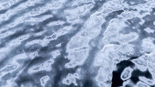 Frozen lake in early winter. Region of La Mauricie. Province of Quebec. Canada