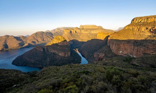 Sunset at Blyde River Canyon with Three Rondawels peak, view of canyon with Blyde River and Mesa