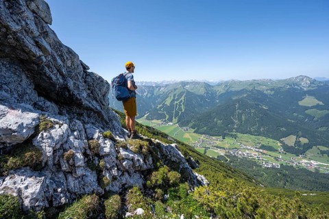 Mountaineer enjoying the view, ascent to Hochunnütz, Unnütz crossing, Brandenberg Alps, Tyrol,