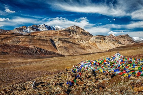 Buddhist prayer flags (lungta) on top of Baralacha La pass on Manali-Leh road. Baralacha La Pass,
