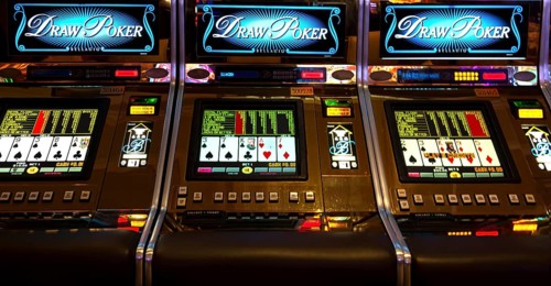Las Vegas, Nevada, USA-March 10, 2019: Casino machines in the entertainment area at night waiting