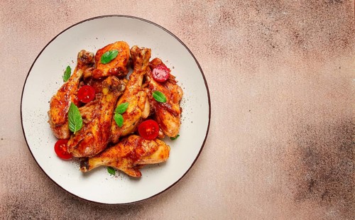 Fried chicken legs, in soy sauce, spices, herbs, top view, homemade