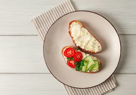 Sandwich, with cream cheese, homemade, on a cutting board, rustic style, no people, selective