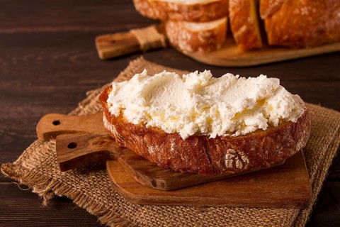 Sandwich, with cream cheese, homemade, on a cutting board, rustic style, no people, selective