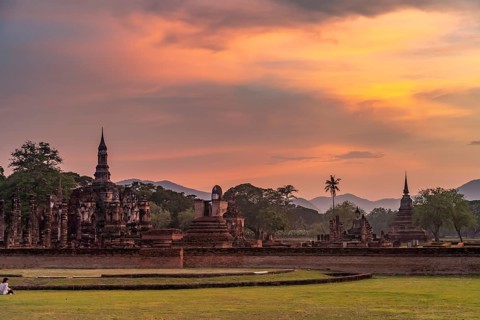 The central Buddhist temple Wat Mahathat at sunset, UNESCO World Heritage Sukhothai Historical