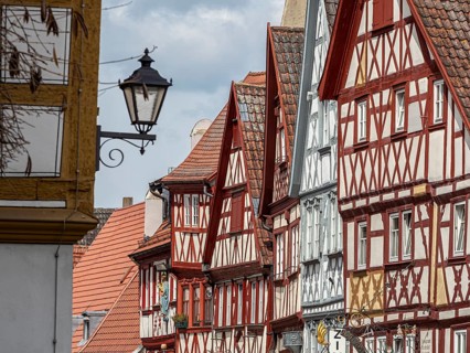 Historical houses in downtown Ochsenfurt at river Main, Bavaria, Germany, Europe