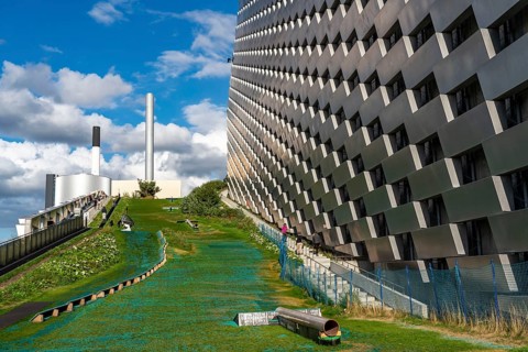 CopenHill, waste incineration plant and artificial ski slope, skiing with a view of the ski lift,