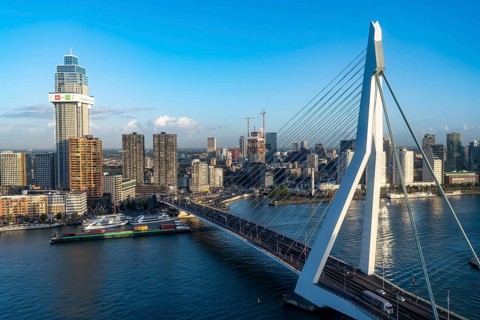 The skyline of Rotterdam, with the Erasmus Bridge over the Nieuwe Maas, Netherlands