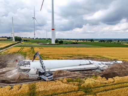 Demolished tower of a 20 year old wind turbine, in the Werl wind farm, 5 old Enercon E-66 turbines