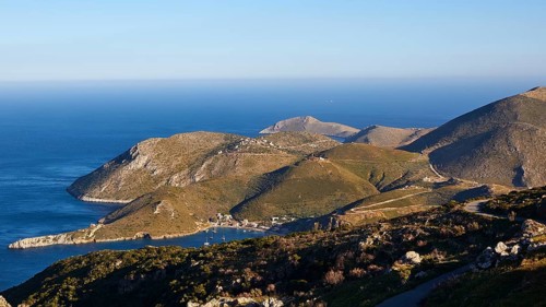 View of a picturesque coastline with mountains and the sea under a blue sky, southern tip, Mani