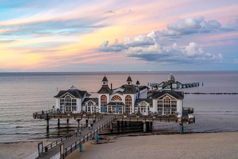 The pier of Sellin, evening mood, sunset, 394 metres long, with restaurant, jetty, beach chairs,