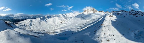Alpine panorama, aerial view with Kesch hut, behind mountain peak Piz Kesch, Albula Alps, Rhaetian