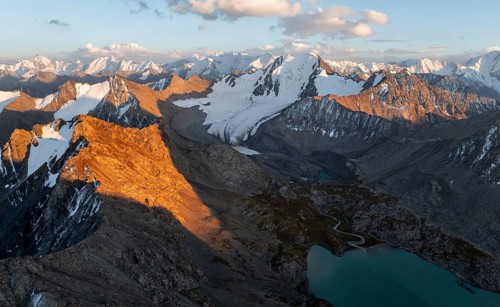 Evening mood, mountain panorama, aerial view, 4000 metre peak with glacier, mountain pass and