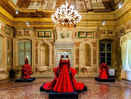Red silk Mikado wedding dress in various shades of red with embroidered bodice, 2009, exhibition of