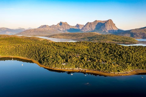 Aerial view over the fjord Efjord south of Narvik, seen at sunset, leisure boats anchor, holiday
