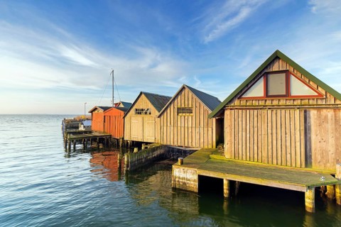 Wooden boathouses in the harbour of the village Althagen, Fischland-Darß-Zingst,