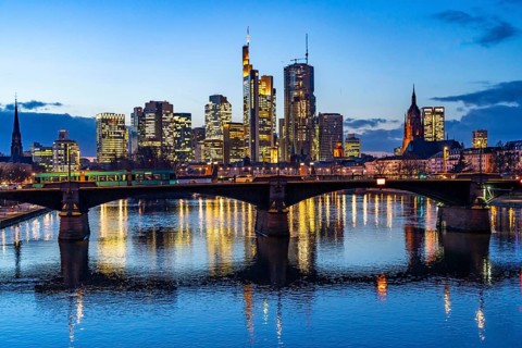 Skyline of the city centre of Frankfurt am Main, river Main, dusk, Ignatz-Bubis-Brücke, Hesse,