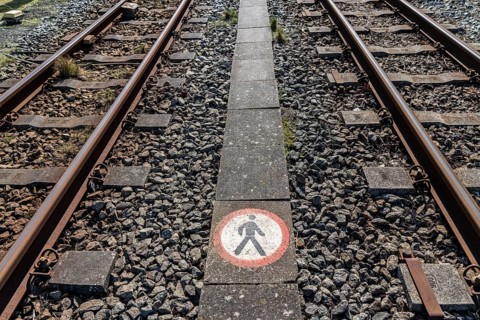 Island railway track, no trespassing sign, passage prohibited, North Sea island of Borkum, Lower