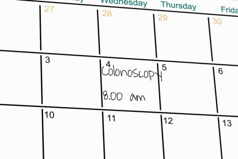 Symbolic image: Reminder of a colonoscopy in an appointment diary