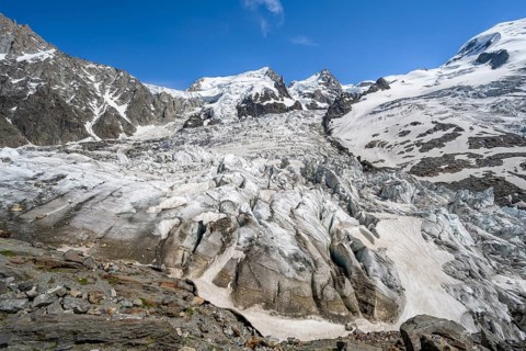 High alpine glaciated mountain landscape, La Jonction, Glacier des Bossons meets Glacier de