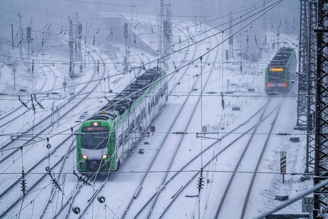 Winter weather, heavy snowfall, railway tracks in front of Essen main station, S-Bahn train, North