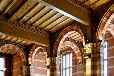 Interior view of Centraal Station, Central Station with flag, Amsterdam, Netherlands