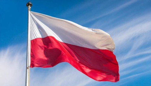 Flags, the national flag of Poland flutters in the wind