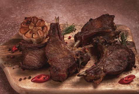 Fried veal ribs, with spices, baked in the oven, homemade, no people