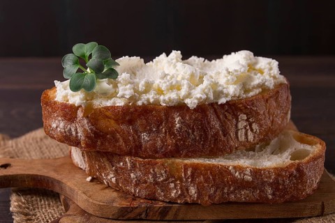 Sandwich, with cream cheese, homemade, on a cutting board, rustic style, no people, selective