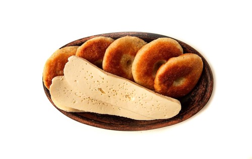 Mchadi, corn tortillas, traditional Georgian dish, corn bread, with Imeretian cheese, homemade, no