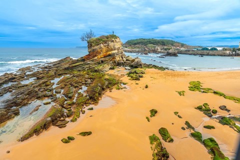 Monument to Neptune Child (Ramon Muriedas) on Camello beach in Santander, Cantabria, Spain, Europe
