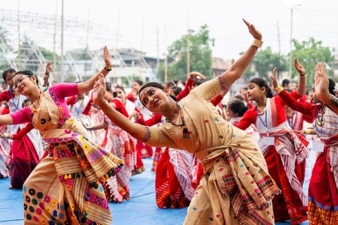 Participants with instructors dance in a Bihu dance workshop ahead of Rongali Bihu Festival, in