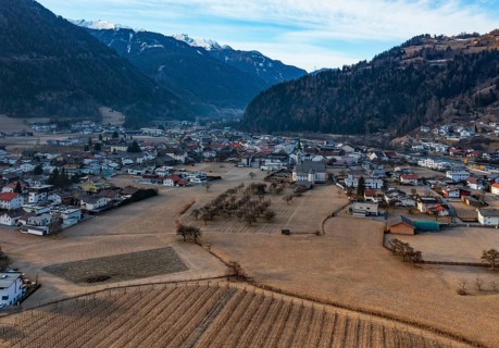 Drone shot, view of village with parish church, Prutz, Kaunertal, Inntal, Tyrol, Austria, Europe
